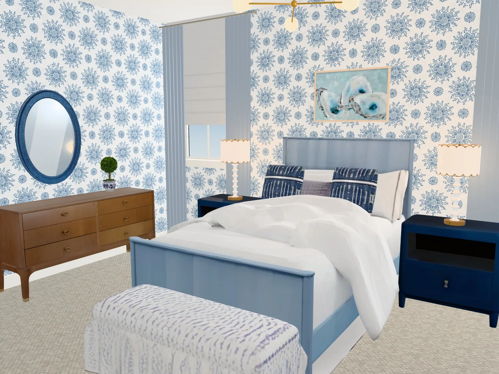 A bedroom by day: a pale blue bed with indigo pillows against blue-and-white floral wallpaper, a walnut dresser under an oval blue mirror, navy nightstands with scalloped lamps and a brass chandelier