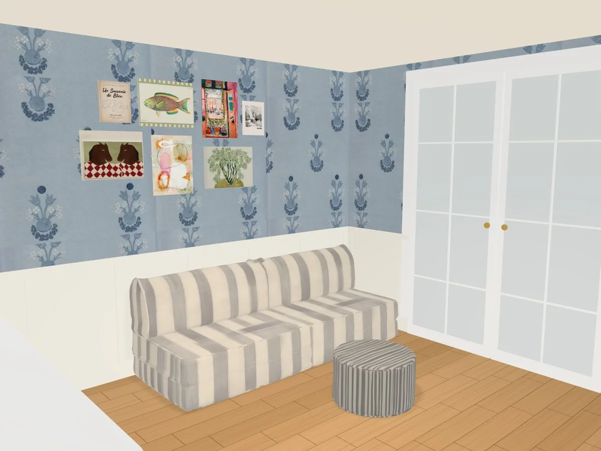 Clare’s son’s playroom in elsewhere: a blue and white striped sofa under a wall of small framed prints, a striped ottoman, blue floral wallpaper over white panelling and a pair of white closet doors